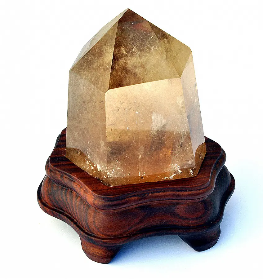 Natural Citrine Point on wooden stand