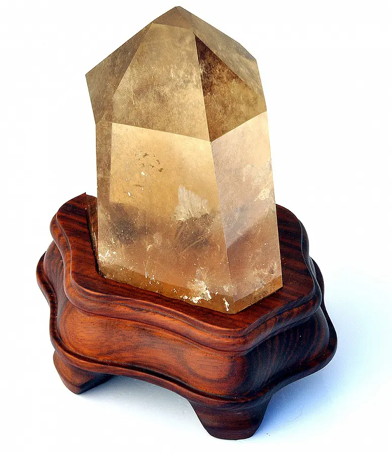 Natural Citrine Point on wooden stand