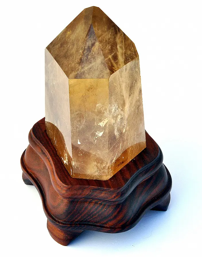 Natural Citrine Point on wooden stand