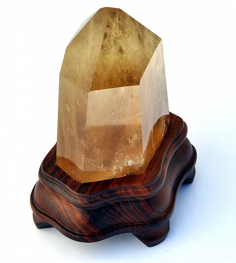 Natural Citrine Point on wooden stand