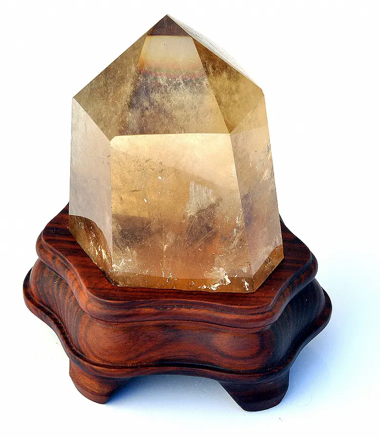 Natural Citrine Point on wooden stand