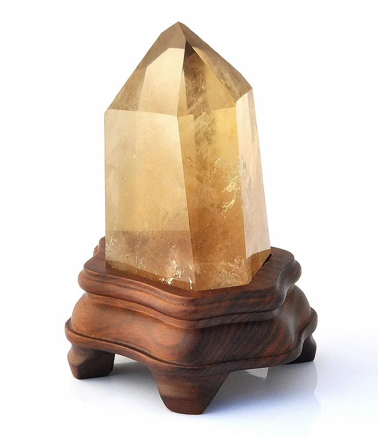 Natural Citrine Point on wooden stand